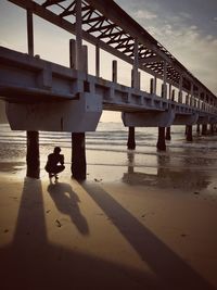 View of bridge over sea against sky