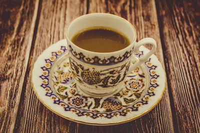 High angle view of coffee cup on table