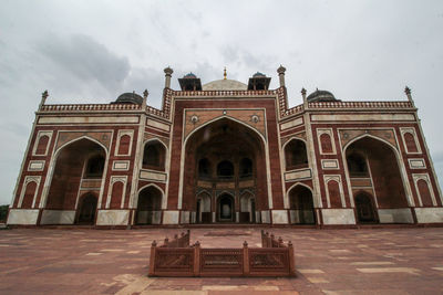 Facade of historical building against sky