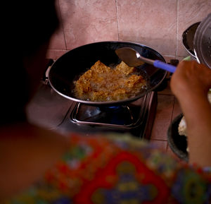 Close-up of person preparing food