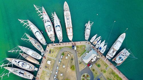 High angle view of commercial dock against sea in city