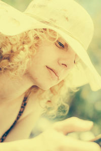 Low angle view of woman wearing sun hat