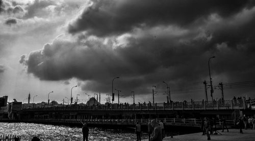 Pier over river against sky