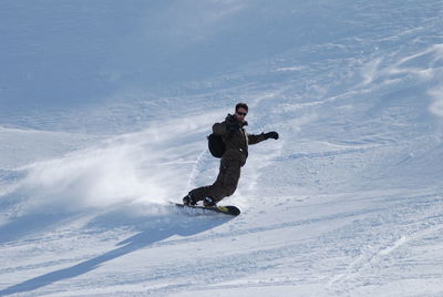 Man snowboarding