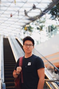 Portrait of man standing outdoors