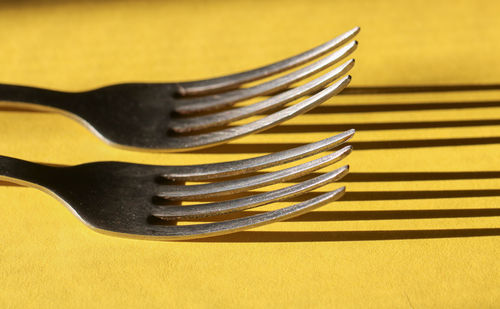 High angle view of fork on table