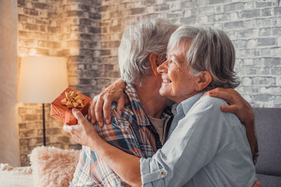 Side view of senior couple with daughter