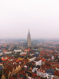 High angle view of buildings in city against sky