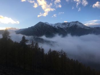 Scenic view of mountains against sky during winter