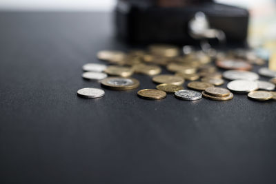 Close-up of coins on table