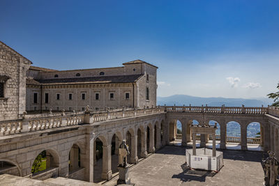 View of historic building against blue sky