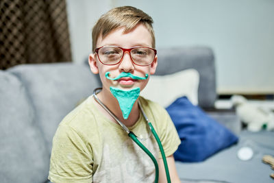 Portrait of boy wearing eyeglasses