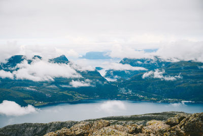 Aerial view of mountain by sea