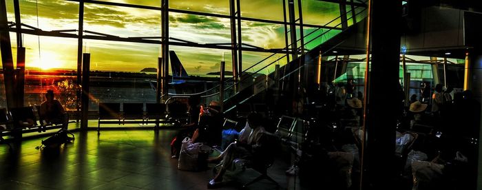 Group of people waiting at railroad station