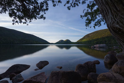 Scenic view of lake against sky at james pond, acadia national park, maine, usa