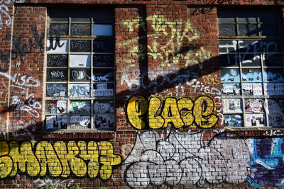 Full frame shot of graffiti on brick wall