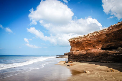 Scenic view of beach against sky