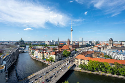 High angle view of buildings in city against sky