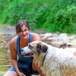 Full length of woman with dog