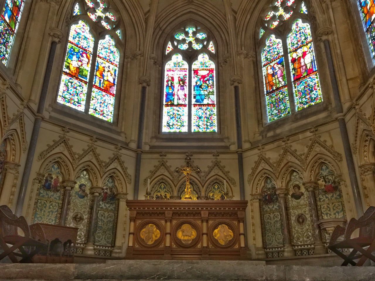 indoors, place of worship, religion, church, spirituality, window, arch, stained glass, architecture, cathedral, built structure, interior, ornate, glass - material, ceiling, art, human representation, design