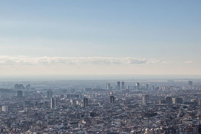 High angle view of buildings against sky in city