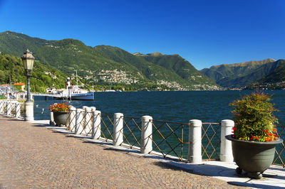 View of calm sea against clear blue sky