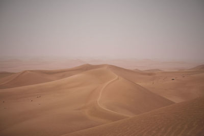 Scenic view of desert against sky