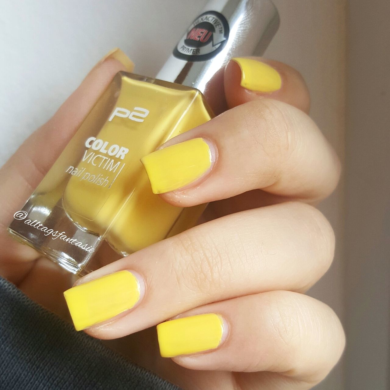 person, holding, indoors, part of, cropped, human finger, yellow, close-up, food and drink, communication, unrecognizable person, nail polish, text, table, studio shot, lifestyles, food