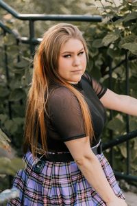 Portrait of beautiful woman standing outdoors