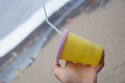 Close-up of person holding ice cream