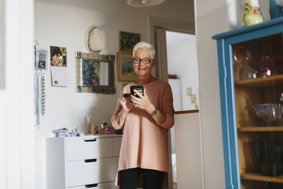 Senior woman using cell phone