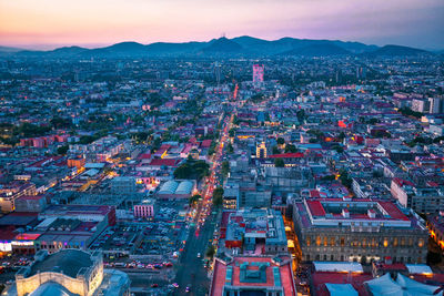 High angle view of illuminated city buildings