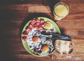 Directly above shot of food on wooden table