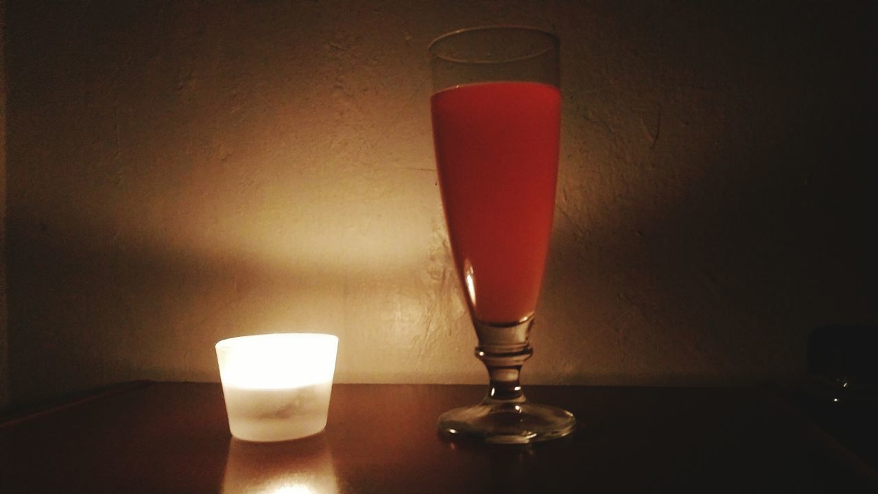 indoors, table, still life, illuminated, red, candle, home interior, glass - material, close-up, drink, food and drink, lighting equipment, drinking glass, lit, no people, transparent, glowing, light - natural phenomenon, refreshment, freshness