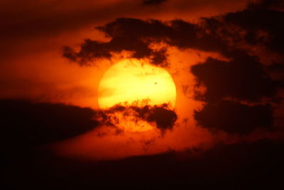Low angle view of cloudy sky at sunset