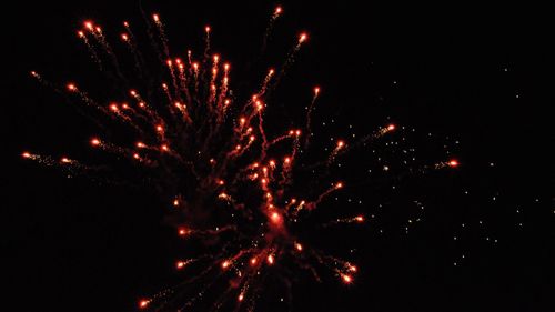 Low angle view of firework display