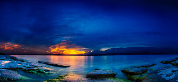 Scenic view of sea against sky during sunset