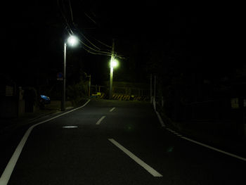 Surface level of street lights on road at night