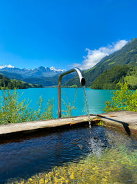 Scenic view of lake against blue sky