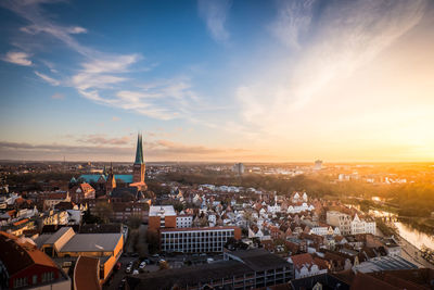 High angle view of city against sky during sunset