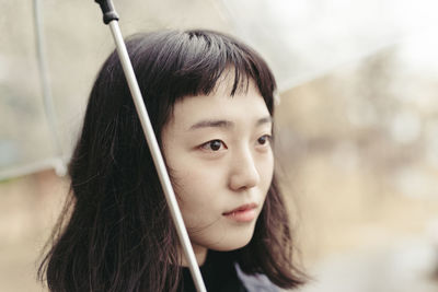 Close-up portrait of young woman