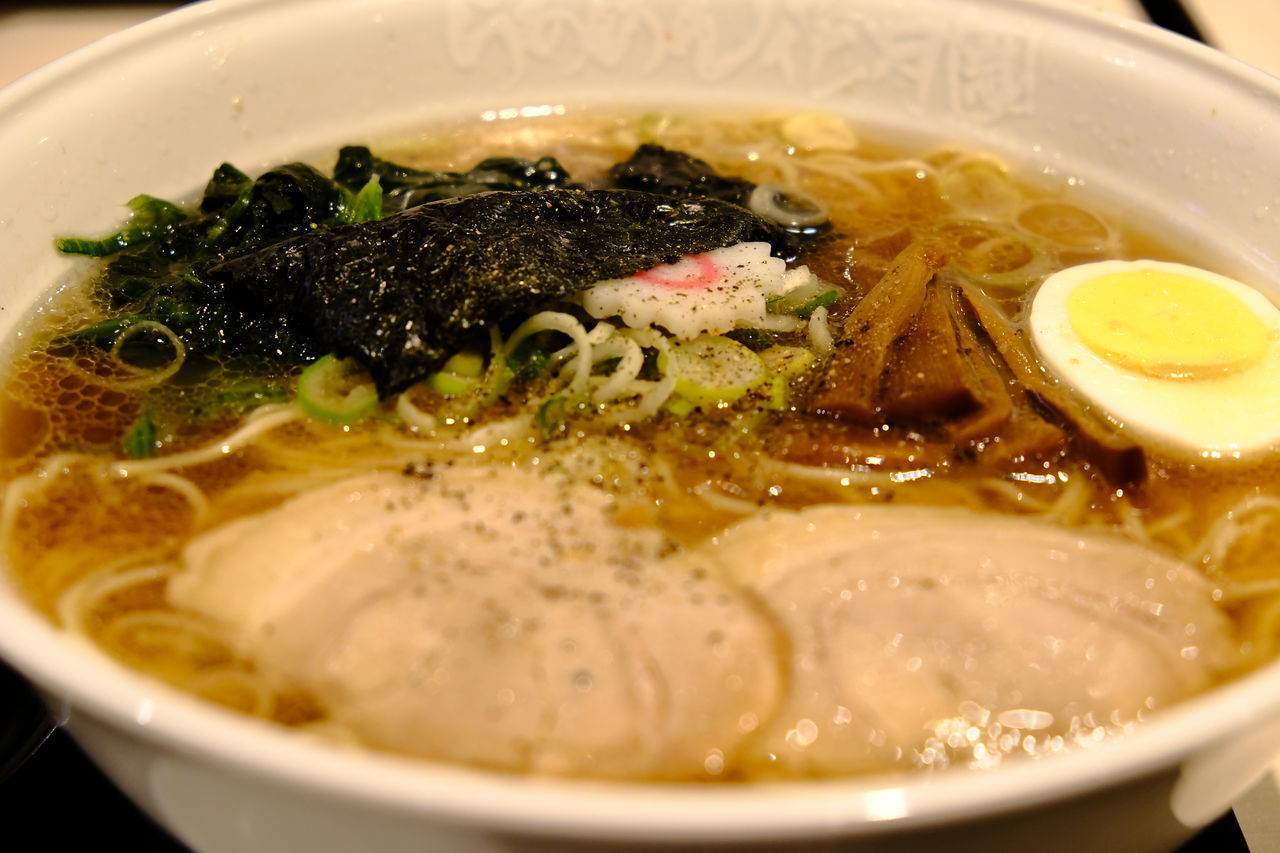 CLOSE-UP OF SOUP IN BOWL WITH RICE