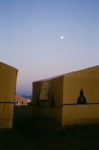 Man against clear sky at dusk