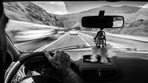 Low section of man in car