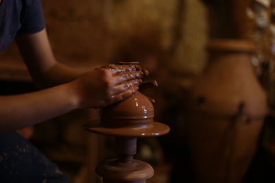 Close-up of hand holding ice cream