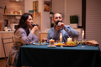 Female friends sitting at restaurant