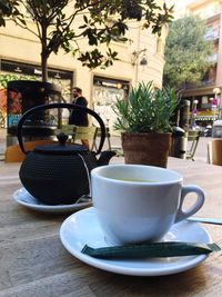 Close-up of coffee cup on table