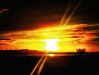 Scenic view of silhouette landscape against sky during sunset