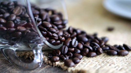 Close-up of coffee beans on table