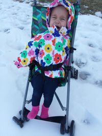 Portrait of cute girl in snow